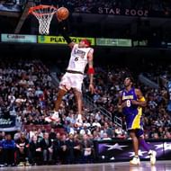 Iverson drives to the basket for a layup